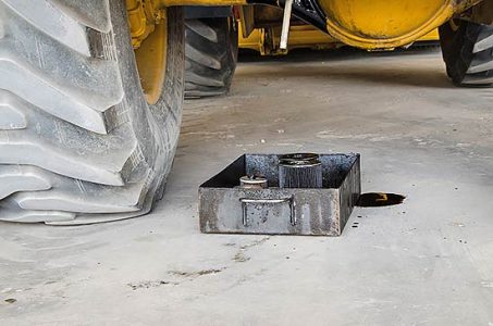Farm Equipment Maintenance: Changing the Oil Image